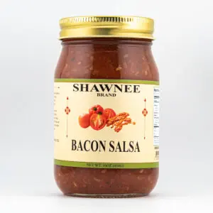 A jar of Shawnee Brand Bacon Salsa, featuring a label with tomatoes and bacon imagery. The jar holds 16 ounces (454g) of product.