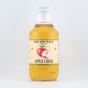 A clear bottle of Shawnee Brand Apple Cider with a white cap is displayed against a plain background.