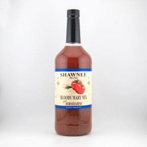 A large bottle of Shawnee Brand Bloody Mary Mix with horseradish, featuring a tomato illustration, is set against a plain white background.