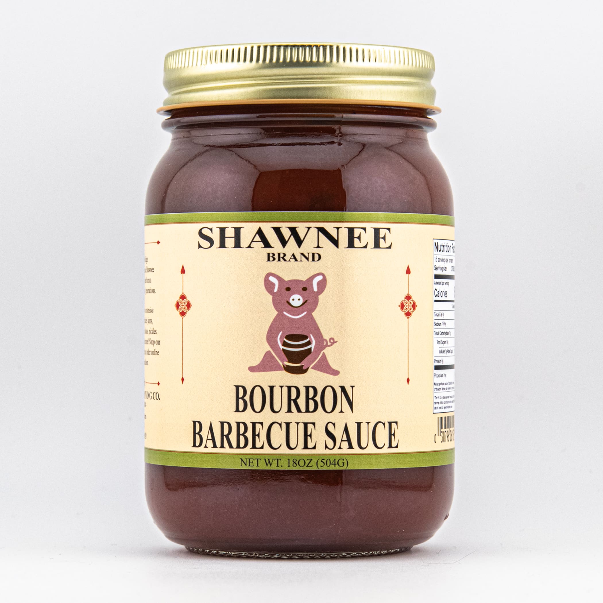 A jar of Shawnee Brand Bourbon Barbecue Sauce featuring a pig illustration, with an 18 oz label and nutrition information visible on the side.