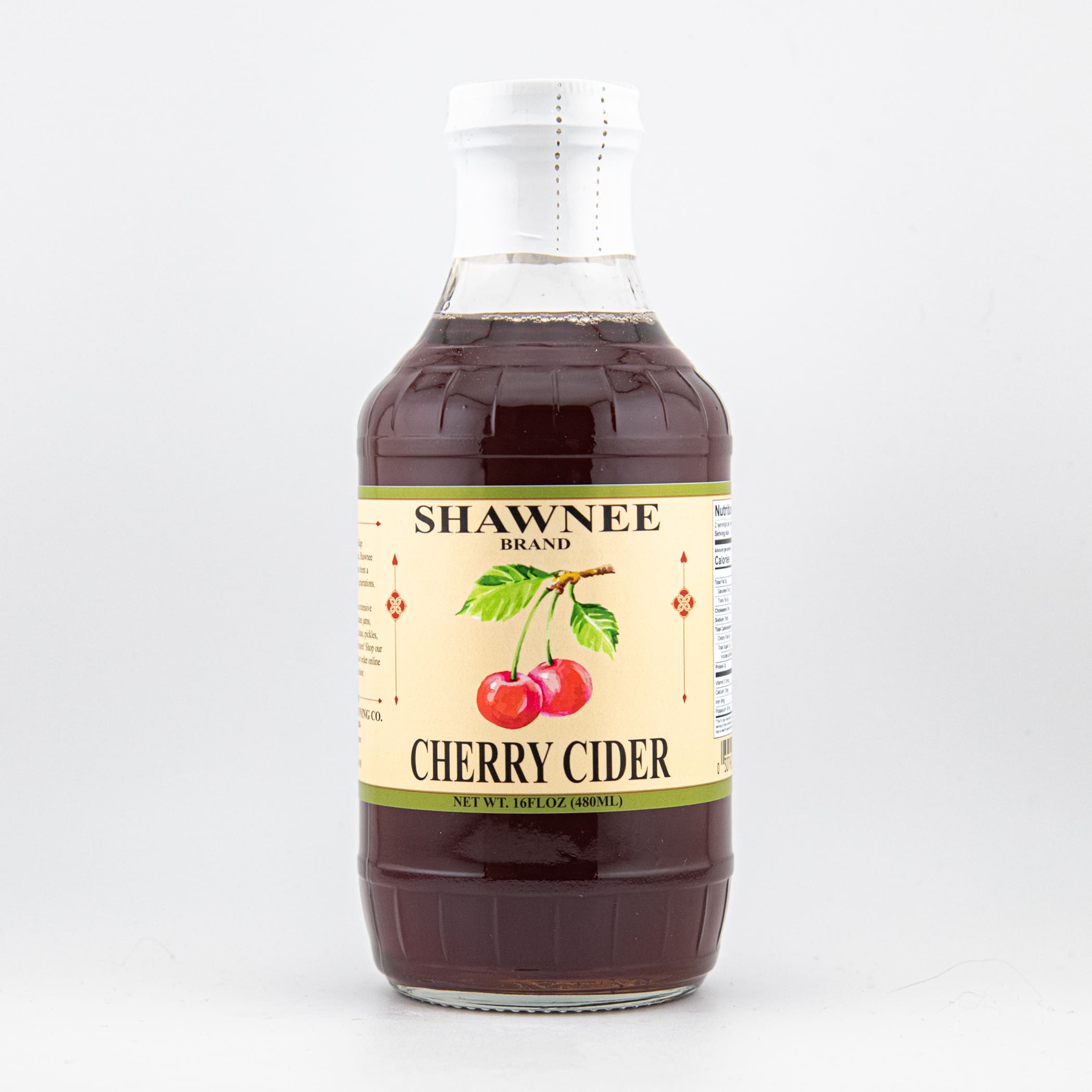 A bottle of Shawnee Brand Cherry Cider with a light yellow label featuring red cherries and product details against a plain background.