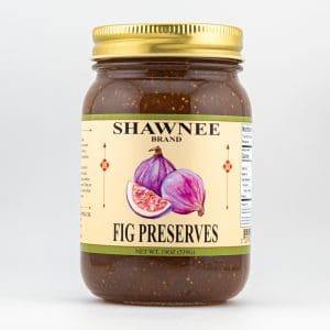 A jar of Shawnee brand fig preserves with a gold lid, featuring an illustrated fig on the label. Net weight: 19 oz (539g).