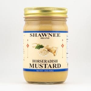 A jar of Shawnee Brand horseradish mustard, featuring a beige label with an illustration of horseradish and text indicating 13 oz (368g).