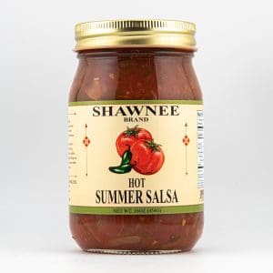 A jar of Shawnee Brand Hot Summer Salsa with tomatoes and peppers on the label, containing 16 oz (454g) of salsa.