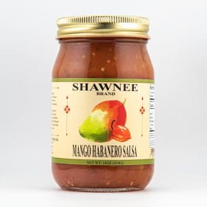 A glass jar of Shawnee Brand mango habanero salsa with colorful label, featuring an image of a mango and habanero pepper.
