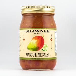 A jar of Shawnee brand mango lime salsa with a gold lid and illustrated fruit label.