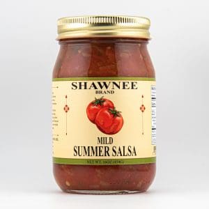 A jar of Shawnee Brand Mild Summer Salsa with a label showing tomatoes, against a plain white background. Label details ingredients and weight.