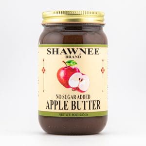 A jar of Shawnee Brand No Sugar Added Apple Butter, featuring an apple illustration, against a plain white background. The net weight is 8oz (227g).