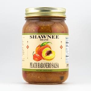 A jar of Shawnee Brand peach habanero salsa, featuring a colorful label with peaches and peppers. Jar contains 16 oz (454g).