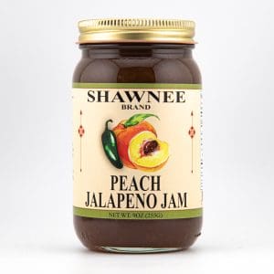 A jar of Shawnee Brand Peach Jalapeno Jam is pictured, featuring a label with images of a peach and jalapeno.