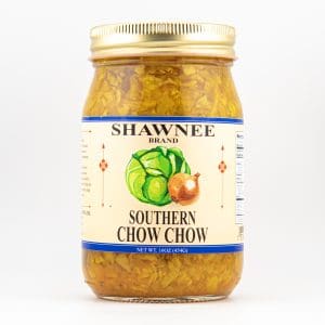 A jar of Shawnee Brand Southern Chow Chow featuring a colorful label depicting cabbage and onion, filled with a mustard yellow relish.