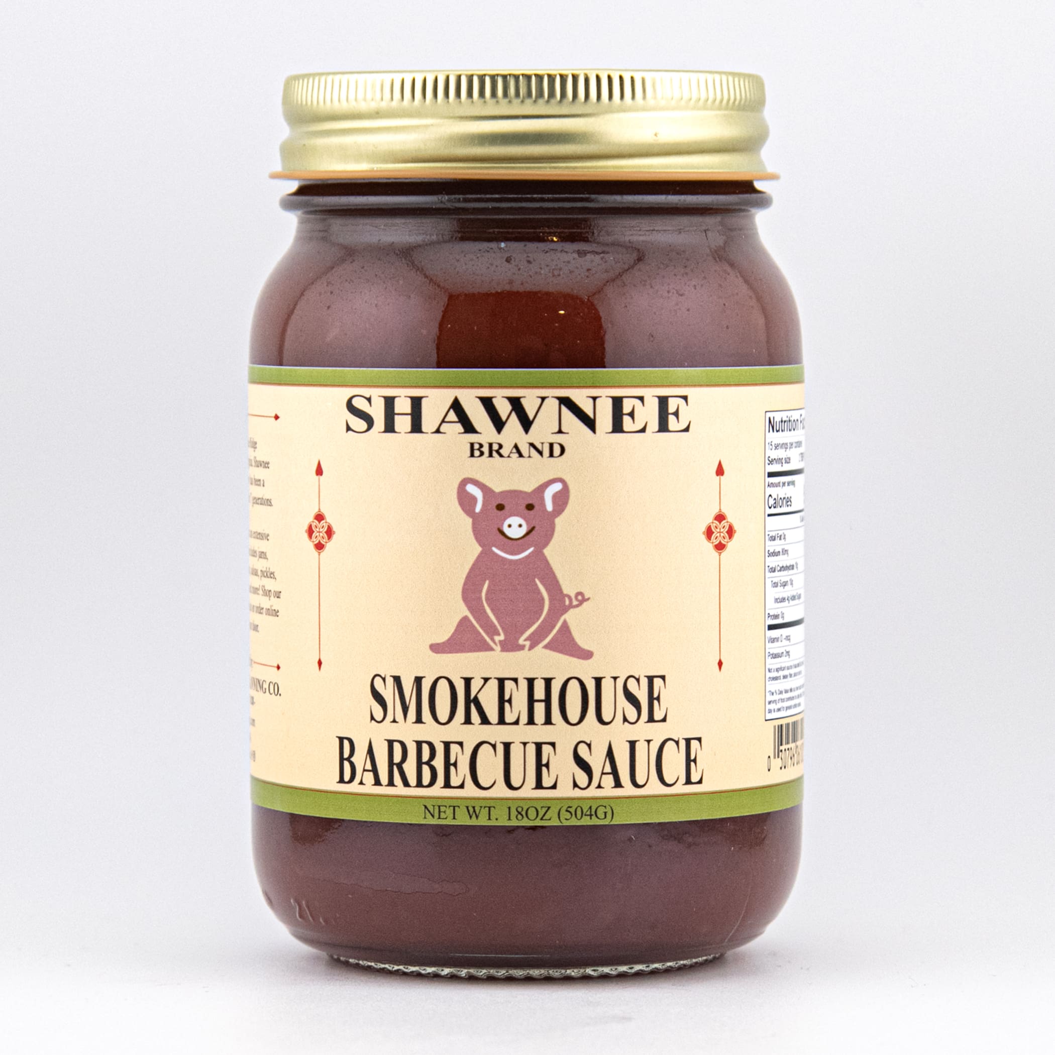 A jar of Shawnee Brand Smokehouse Barbecue Sauce with a bear logo on the label, featuring nutrition information on the side.