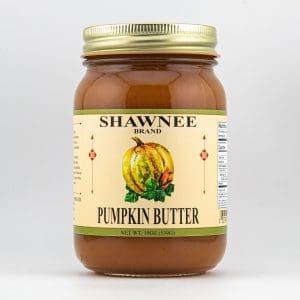 A jar of Shawnee Brand pumpkin butter, with a yellow pumpkin illustration on the label. Contains 19 oz (539g). Nutritional facts visible on the side.