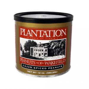 A can of Plantation Peanuts of Wakefield, featuring Cajun Spiced Peanuts, with an illustration of a historic plantation house on the label.