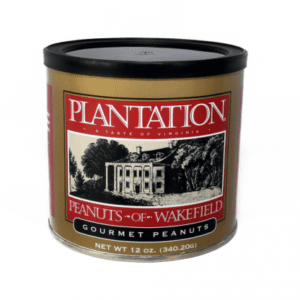A can of Plantation Gourmet Peanuts featuring an illustration of a historical building labeled "Wakefield" on the packaging. Contains 12 oz.
