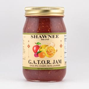 A jar of Shawnee Brand G.A.T.O.R. Jam featuring ginger, apple, tangerine, orange, and raspberry. The label displays colorful fruit illustrations.