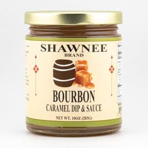 A jar of Shawnee Brand Bourbon Caramel Dip & Sauce with an illustrated caramel and barrel on the label, containing 10 oz (283g).