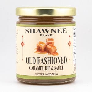 A jar of Shawnee Brand Old Fashioned Caramel Dip & Sauce, featuring caramel pieces on the label. Net weight is 10 oz (283g).