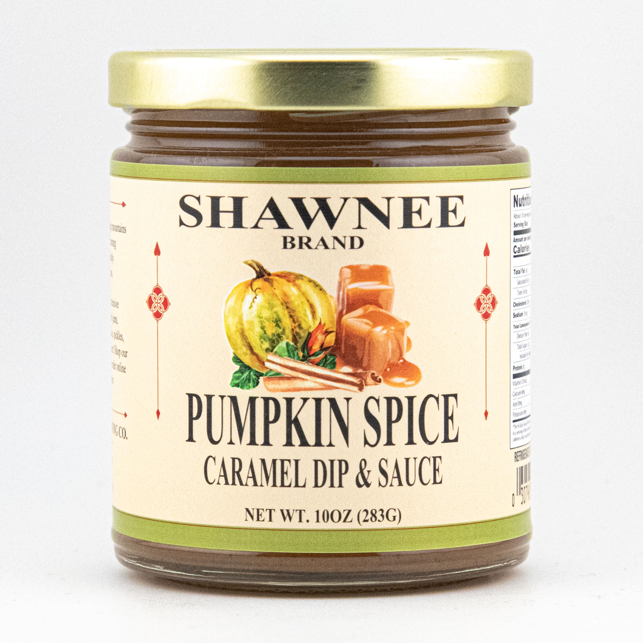 A jar labeled "Shawnee Brand Pumpkin Spice Caramel Dip & Sauce" features a pumpkin illustration on a light-colored background with a gold lid.