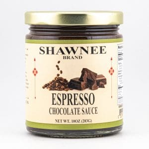 A Shawnee Brand jar containing espresso chocolate sauce, featuring coffee beans and chocolate chunks on the label. Net weight: 10oz (283g).